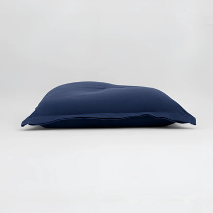 Maxi cuscino firenze in tessuto morbido blu navy con trama leggermente stropicciata dimensioni generose infinito abbraccio