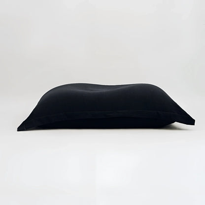 Maxi cuscino firenze nero con tessuto leggermente strutturato e dimensioni generose ideale per infinito abbraccio