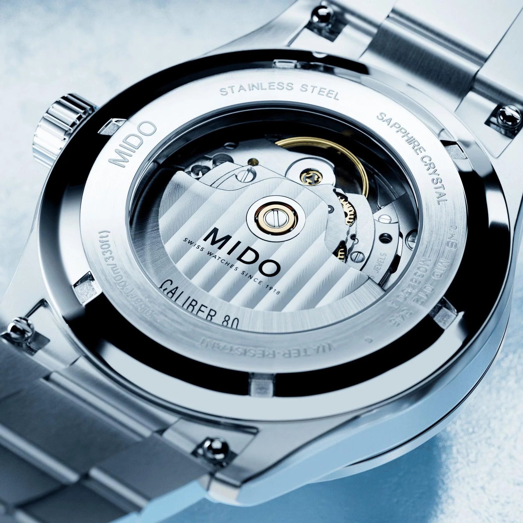 Mido multifort m freeze 42mm turchese automatico acciaio con finitura satinata verticale e mouvemento côtes de genève esposto