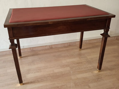 Scrivania stile impero noce con piano in pelle rossa e piedini in ottone design ottocento elegante e funzionale